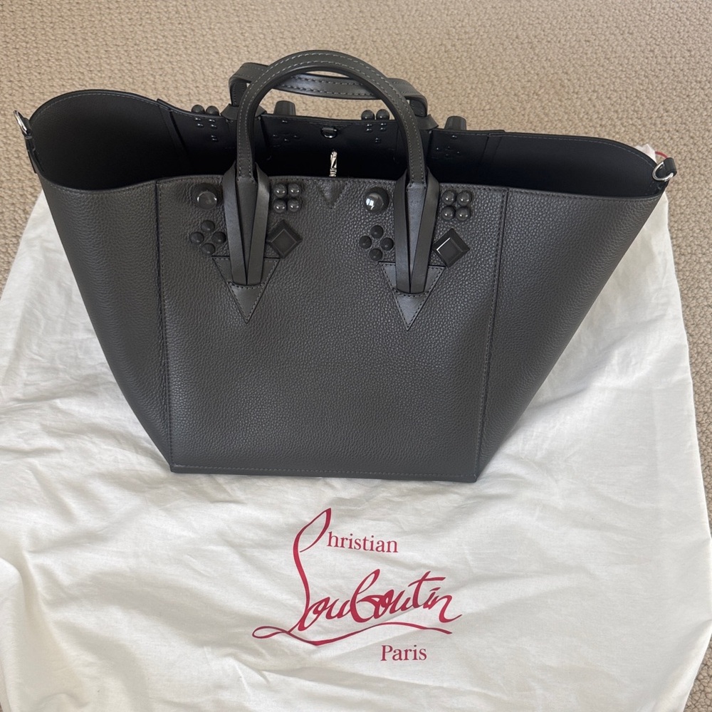 NWT- Christian Louboutin Cabachic Tote with spikes
Dust bag included